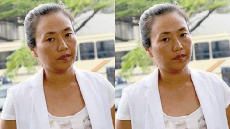 Aisha Huang accused of unleashing dogs on policemen who storm her house to arrest her